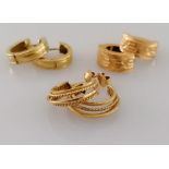 A pair of gold earrings with rope twist decoration, stamped 585, 4.2g and two other pair of