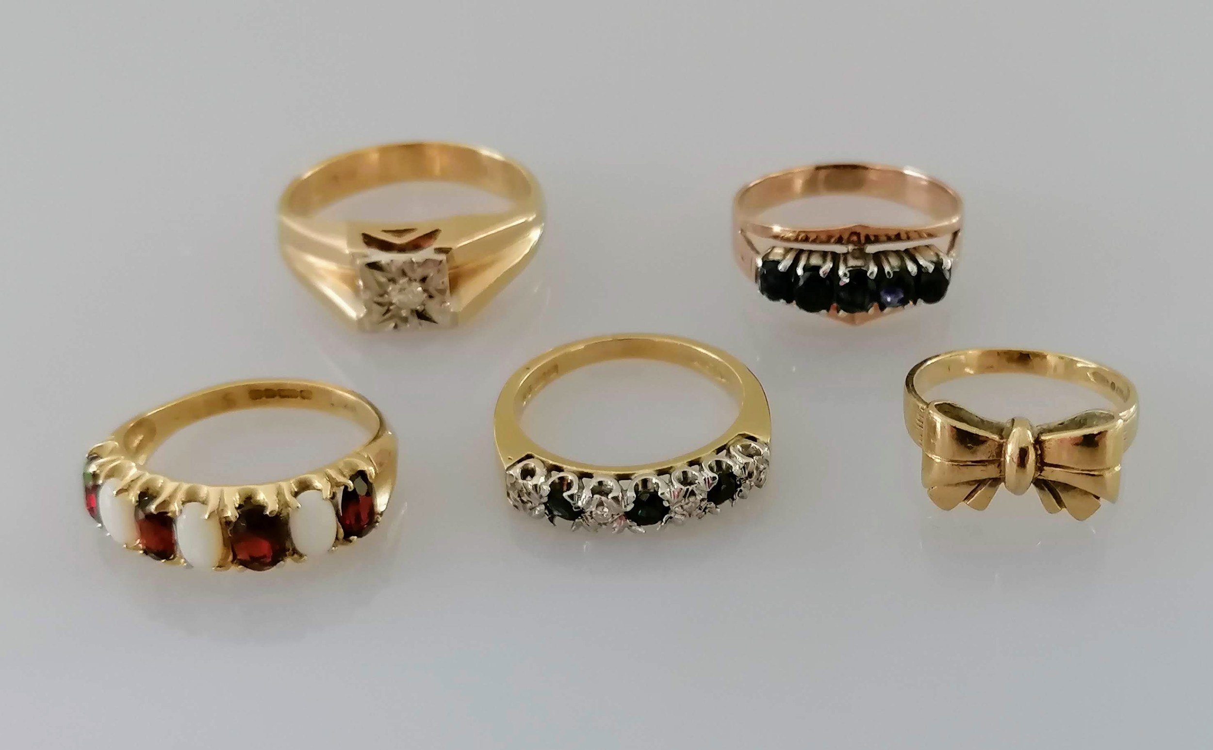 A selection of four gold gem-set rings and one other, smallest J, largest M, all hallmarked or - Image 2 of 4