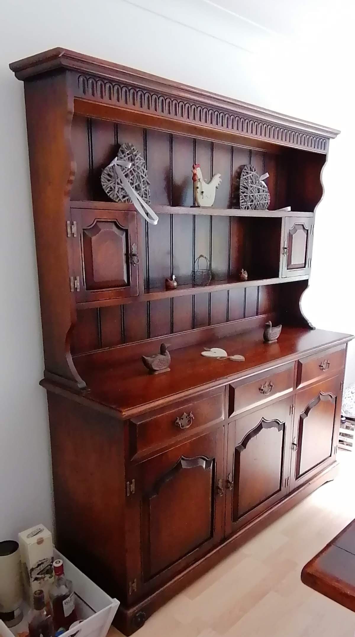 A Royal Oak Furniture Company Balmoral range dresser with shaped cornice, three frieze drawers and