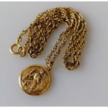 A gold St. Christopher pendant and chain, hallmarked 9ct, 18mm diameter, chain 52 cm, 9.06g