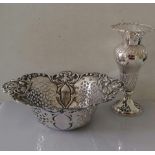 An Edwardian oval silver pierced basket with C-scroll decoration in relief by William Adams Ltd,