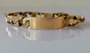 A 1980's 9ct yellow gold identity bracelet, some links textured, 19 cm, hallmarked, 52.7g