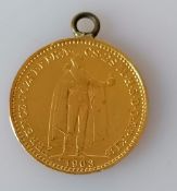 A Hungarian Franz Joseph 20 korona gold coin, 1903, with chain loop, 6.86g