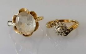 A diamond cluster ring and oval gem-set dress ring, both on 9ct yellow gold, hallmarked, sizes L, Q,