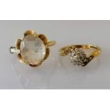 A diamond cluster ring and oval gem-set dress ring, both on 9ct yellow gold, hallmarked, sizes L, Q,