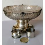 A George V silver tazza with a frosted glass liner, wavy rim, elaborate pierced decoration on a
