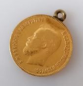 A 1901 Russian Nicholas II 10 rouble gold coin with chain loop, 8.74g