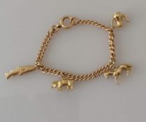 A 9ct yellow gold charm bracelet, 17 cm, hallmarked, 21.62g