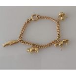 A 9ct yellow gold charm bracelet, 17 cm, hallmarked, 21.62g