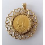A Victorian gold full sovereign, 1888, Melbourne mint on a hallmarked 9ct gold mount, 12g