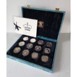 A Royal Mint 12 Silver Proof Crown coin collection in case celebrating the Seventieth Birthday of