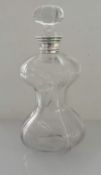 A Victorian silver-collared glass decanter of waisted form, London, 1898, maker's mark rubbed, 25.