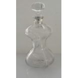 A Victorian silver-collared glass decanter of waisted form, London, 1898, maker's mark rubbed, 25.