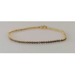 A champagne diamond line or tennis bracelet, the round brilliant-cut champagne diamonds, estimated