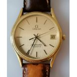 A 1980's gold plated Omega Seamaster Quartz watch with gold coloured round dial, gold markers/hands,