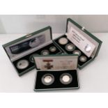 A Royal Mint 1997 and 2005 Silver Proof four-coin Britannia Collection and a Royal Mint Victoria