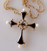 A 'Midnight Sapphire Cross' from The House of Igor Carl Faberge for Franklin Mint, 14ct gold blue