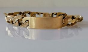 A 1980's 9ct yellow gold identity bracelet, some links textured, 19 cm, hallmarked, 49g