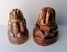 Two 19th century copper jelly moulds, 18.5, 20 cm