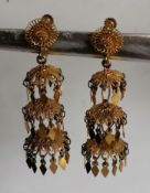 A pair of Oriental-style gold tassel screw-back earrings with fine filigree design, each 55mm