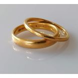 Two 22ct yellow gold wedding bands, sizes P, Q, 4mm, 2mm, both hallmarked, 8.09g