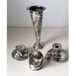 A Victorian silver chamberstick with egg and dart decoration, removable sconce, crested