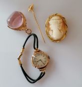 A 9ct gold framed cameo brooch, 42 x 33mm; a 15ct gold pin brooch with pearl decoration, both
