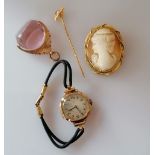 A 9ct gold framed cameo brooch, 42 x 33mm; a 15ct gold pin brooch with pearl decoration, both