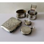 A George V silver cigarette case with etched seaweed decoration, 8 x 7 cm, by E J Trevitt & Sons,