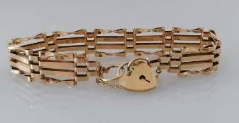 A 9ct yellow gold gate-link bracelet with padlock clasp, hallmarked, 10g