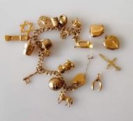 A 9ct yellow gold charm bracelet with four extra charms, all hallmarked, 25.5g