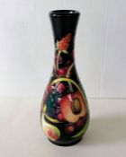 A Moorcroft vase in the 'Queens Choice' design by Emma Bossons, impressed and painted marks, 21 cm