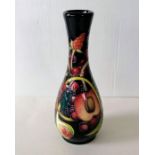 A Moorcroft vase in the 'Queens Choice' design by Emma Bossons, impressed and painted marks, 21 cm