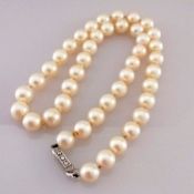 An Art Deco cultured pearl necklet comprising forty-three Akoya beads measuring 7.9mm to 8.5mm