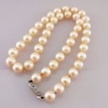 An Art Deco cultured pearl necklet comprising forty-three Akoya beads measuring 7.9mm to 8.5mm