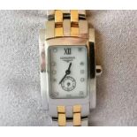 A Longines Dolcevita ladies diamond watch, white face 18mm, sword hands, subsidiary seconds hand