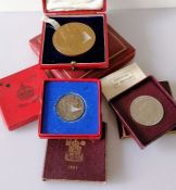 A Victorian cased bronze Jubilee Medal, 1887, 77mm; a cased 1902 Coronation Medal, two boxed silver