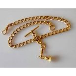 A yellow gold curb-link Albert chain with T-bar and lobster clasp, each link stamped 18ct, unmarked