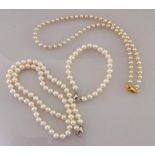 A cultured pearl necklace and bracelet set; the necklace of seventy 6-6.5mm cultured cream pearls