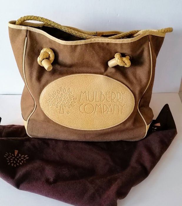 A Mulberry canvas bag with pigskin trimmings, woven leather straps with original cotton dust bag