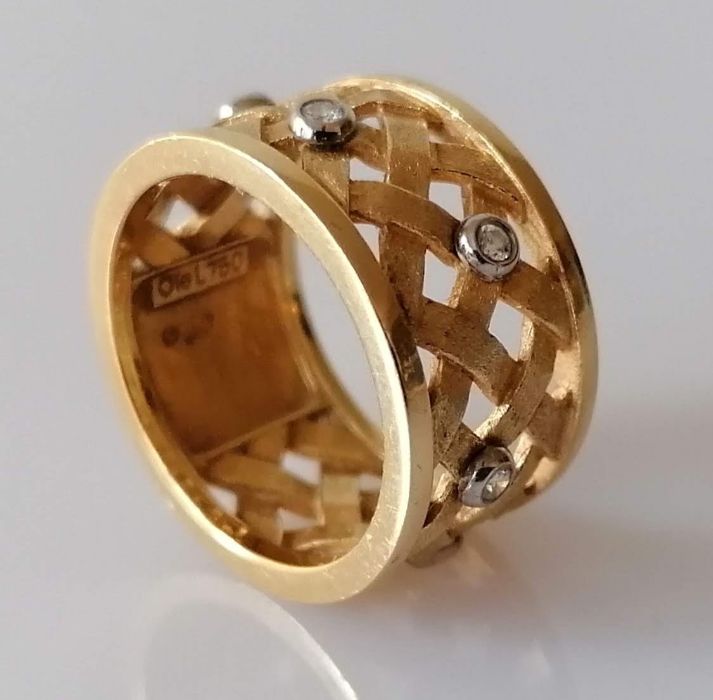 An Ole Lynggaard gold and diamond lattice ring, size N, stamped 750 and signed Ole
