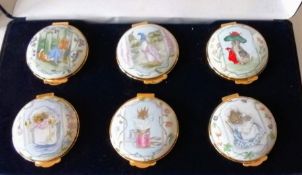 A cased set of six Crummles & Co. for Royal Doulton Beatrix Potter enamel pill boxes