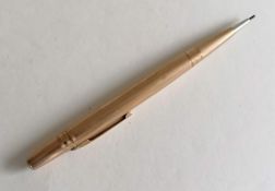 A Life-Long gold-cased pencil with engine turned design, 13 cm, 20.8g, nib good, slight dent to top