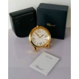 A Chopard Happy Sport table clock silvered dial with gilt quarterly Roman numerals, strut stand, ser