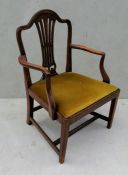 A Georgian mahogany-framed carver chair with domed top, carved splat, drop-in seat on stretcher supp