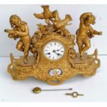 A 19th century French porcelain and ormolu mantel clock, the striking movement by Japy stamped for '