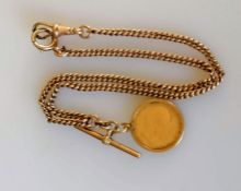 An Edwardian gold half sovereign, 1908, attached to rose gold watch chain with T-bar and clasp