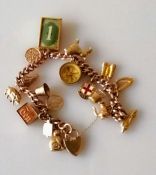 A 9ct yellow gold charm bracelet, each charm and chain (rose gold) hallmarked, 42.9g