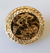 A mounted gold half sovereign ring, dated 1982, with pierced decoration, hallmarked 9ct, 8.78g