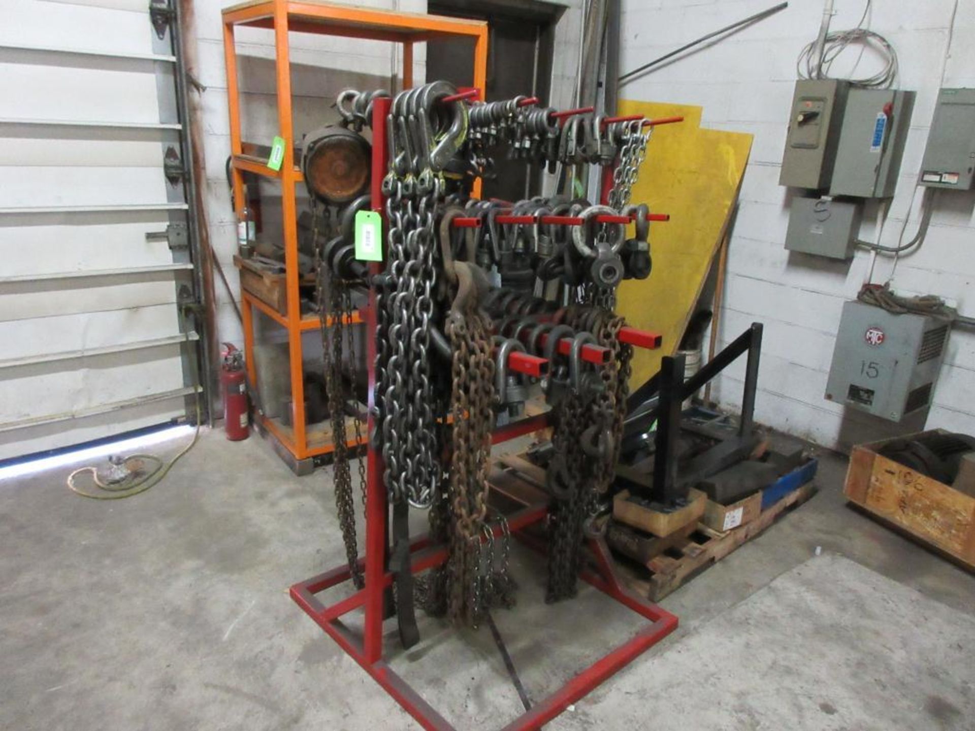 RACK W/ ASSORTED LIFTING EYES, EYE BOLTS, SHACKLES, HOOK CHAINS, HOIST, RACK BASE 3' X 3' X 5' H